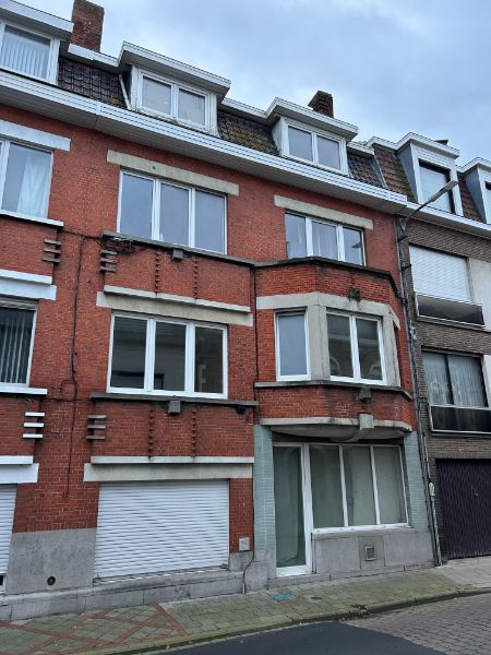 Woning dichtbij het centrum thans ingedeeld in 3 appartementen. foto 12