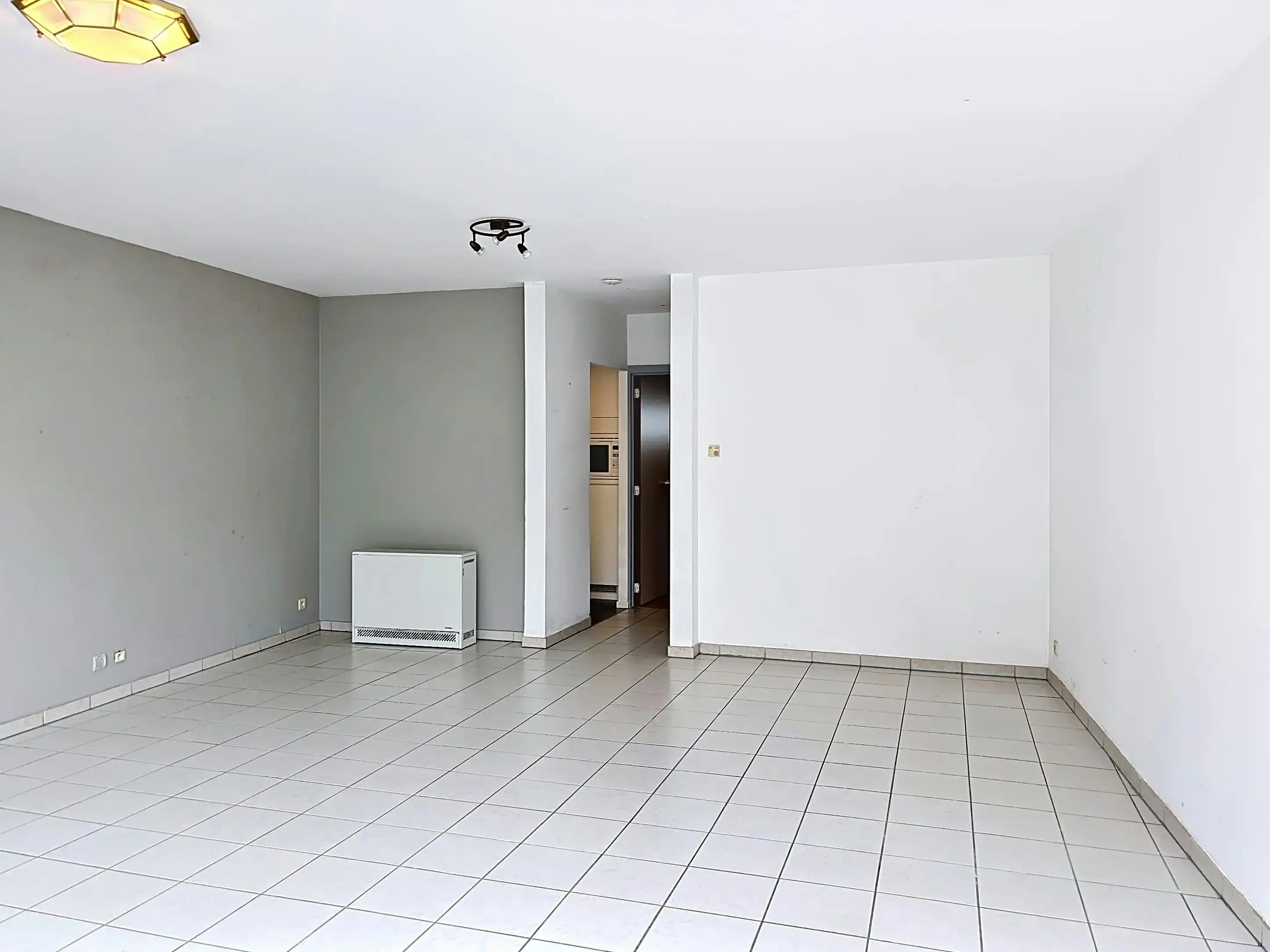 Instapklaar gelijkvloers appartement met gemeenschappelijke tuin en fietsenberging in hartje Kapellen! foto 5