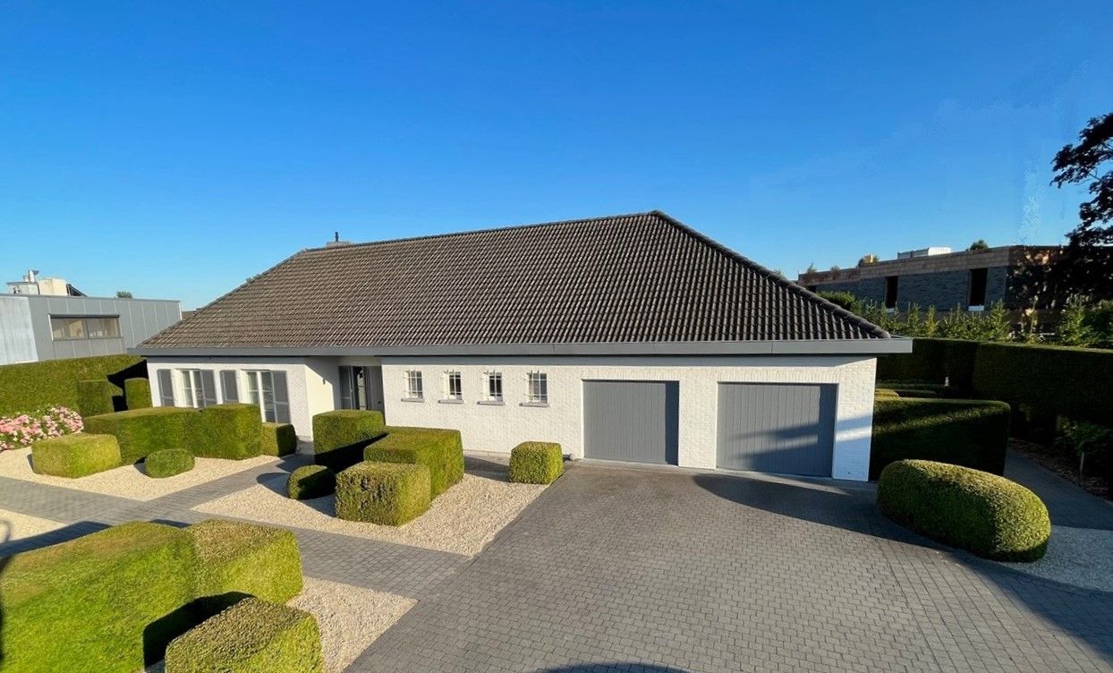 Prachtige villa met zwembad op een perceel van 2.364m² aan de stadsrand van Bree foto 4