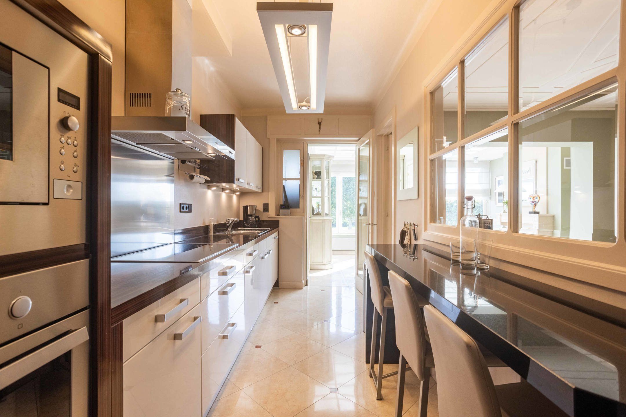 Unieke burgerwoning met tuin en perceel bouwgrond met garage foto 8