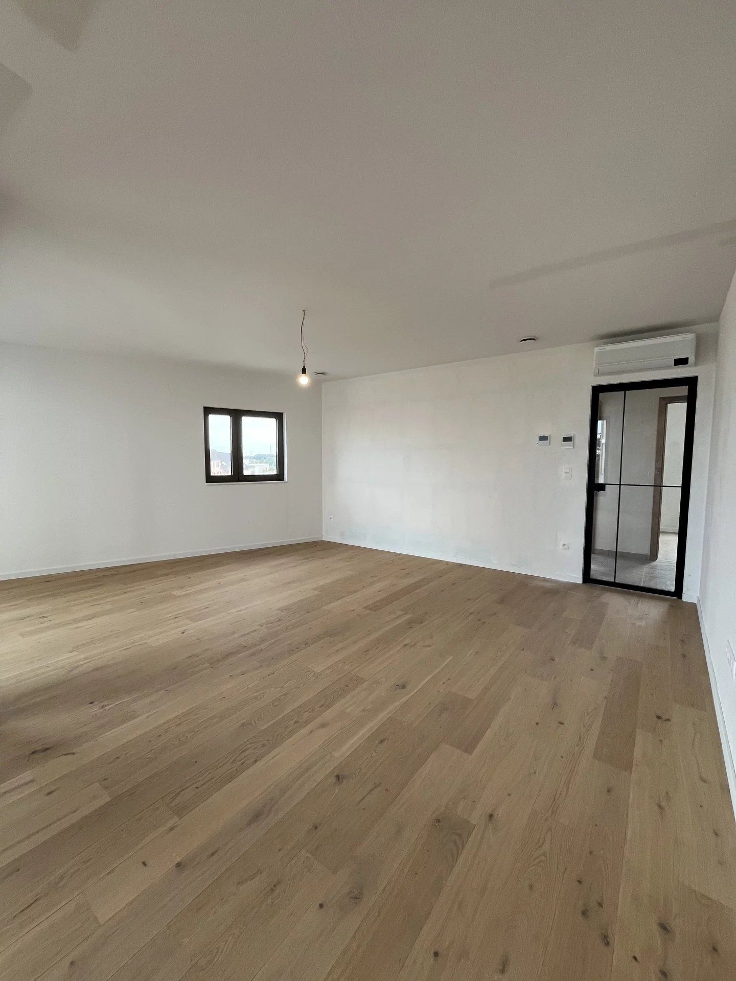 Ruim nieuwbouwappartement te Beringen centrum foto 2