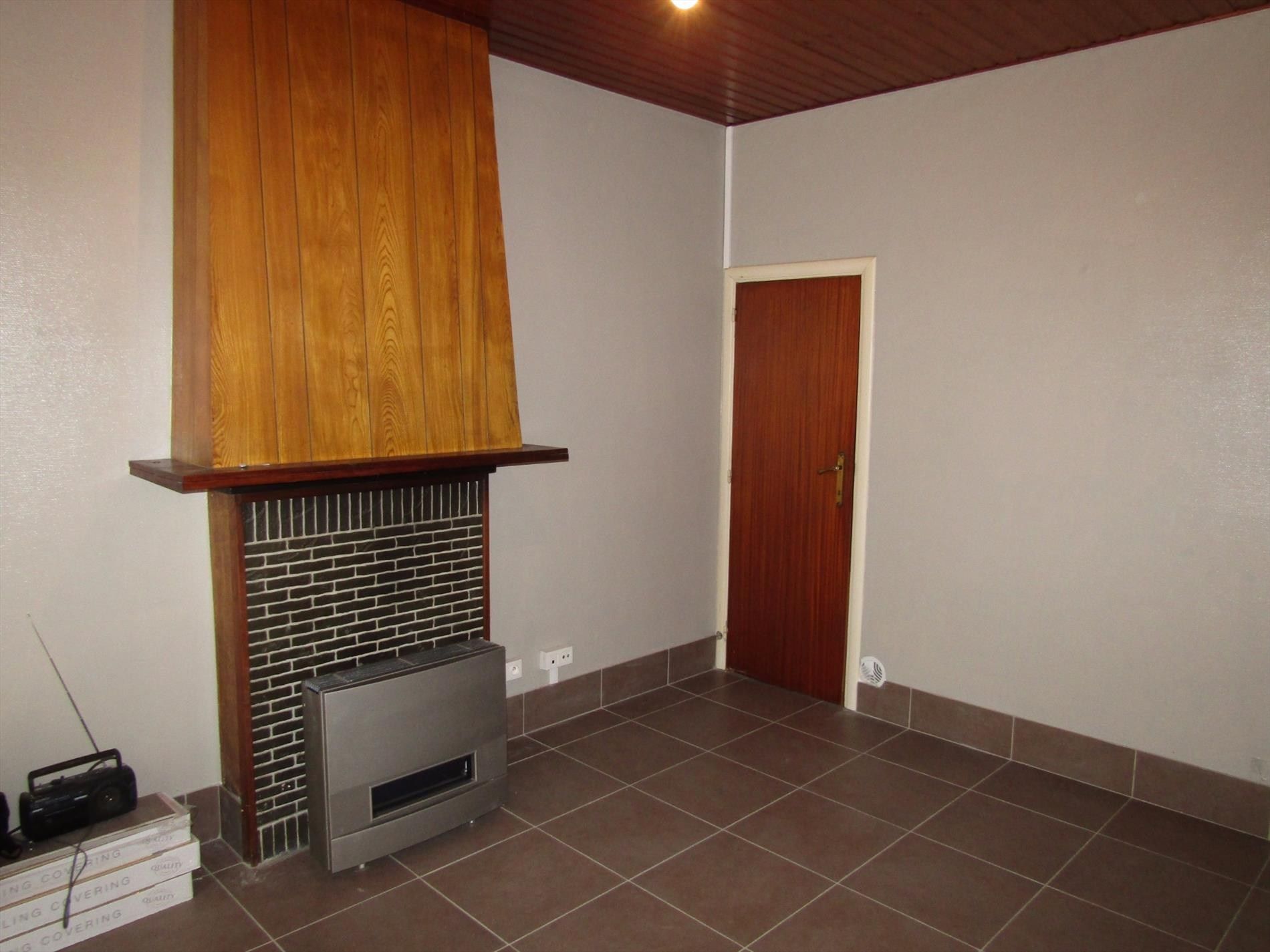 Stadswoning met 3 slpk en tuintje te koop op zeer goede locatiein Kortrijk. foto 6