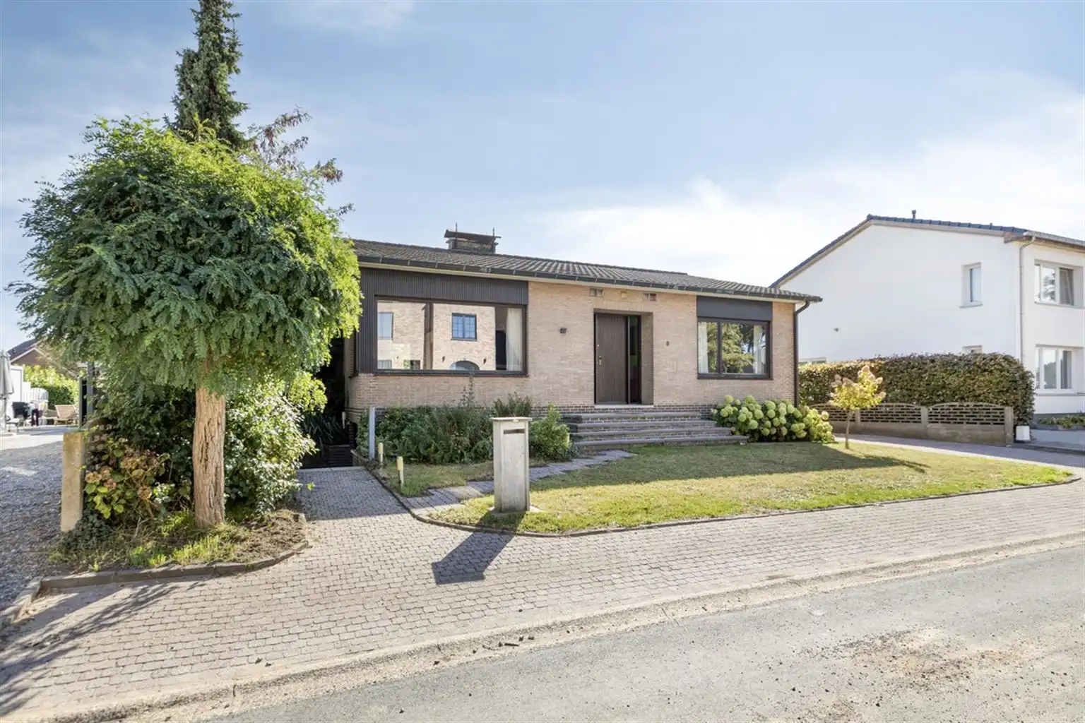 Vrijstaande woning met 3 slaapkamers, ruime tuin en garages op een riant perceel van 9a18ca, rustig gelegen nabij het centrum van Maaseik.  foto 29