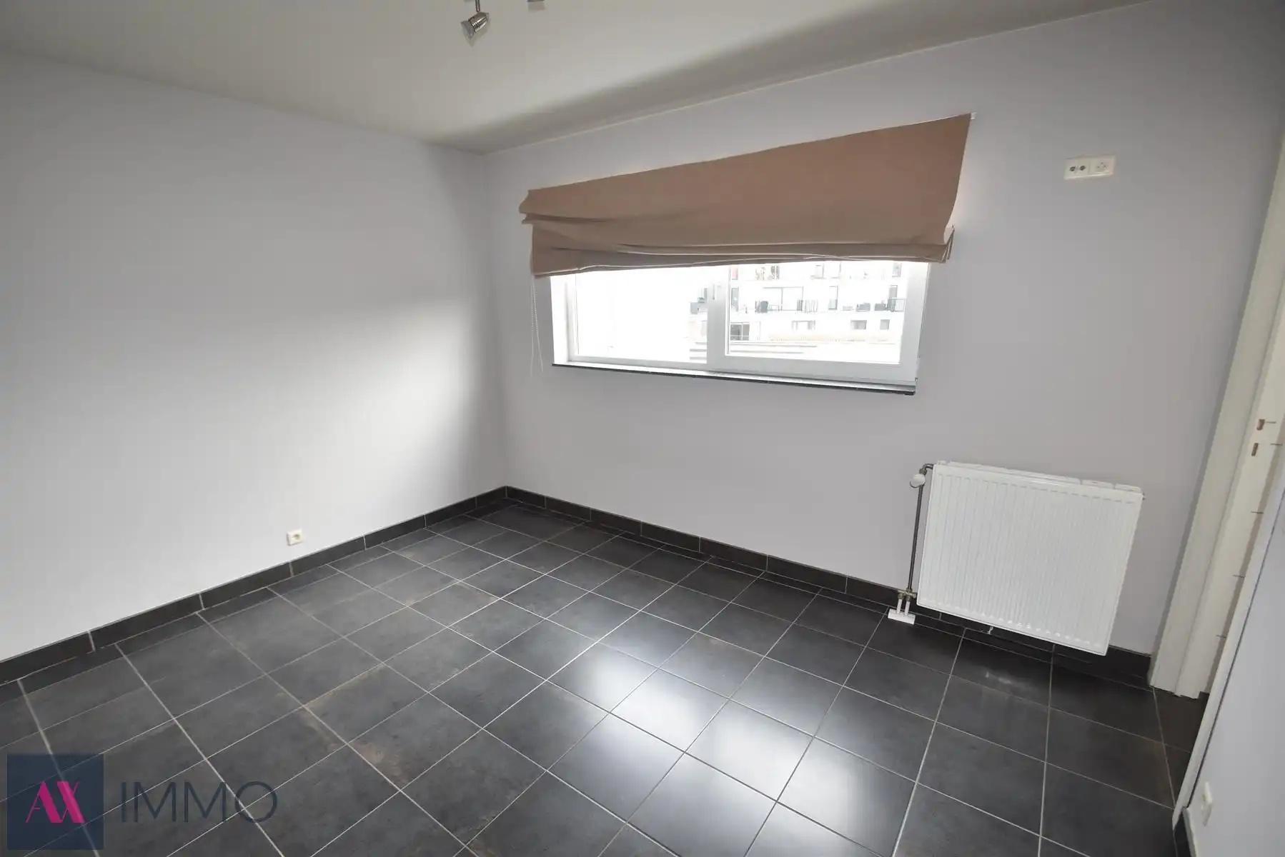 Centraal gelegen 1-slpk-apt met groot terras van 20 m², lift, vrij vanaf 01/12 foto 7