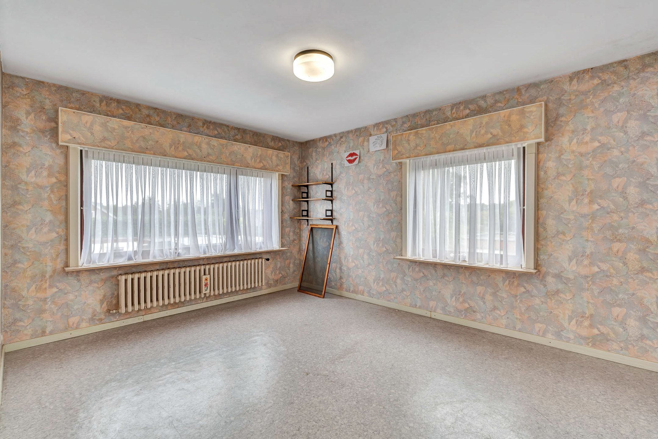 Halfopen woning met veel potentieel op ruim perceel foto 6