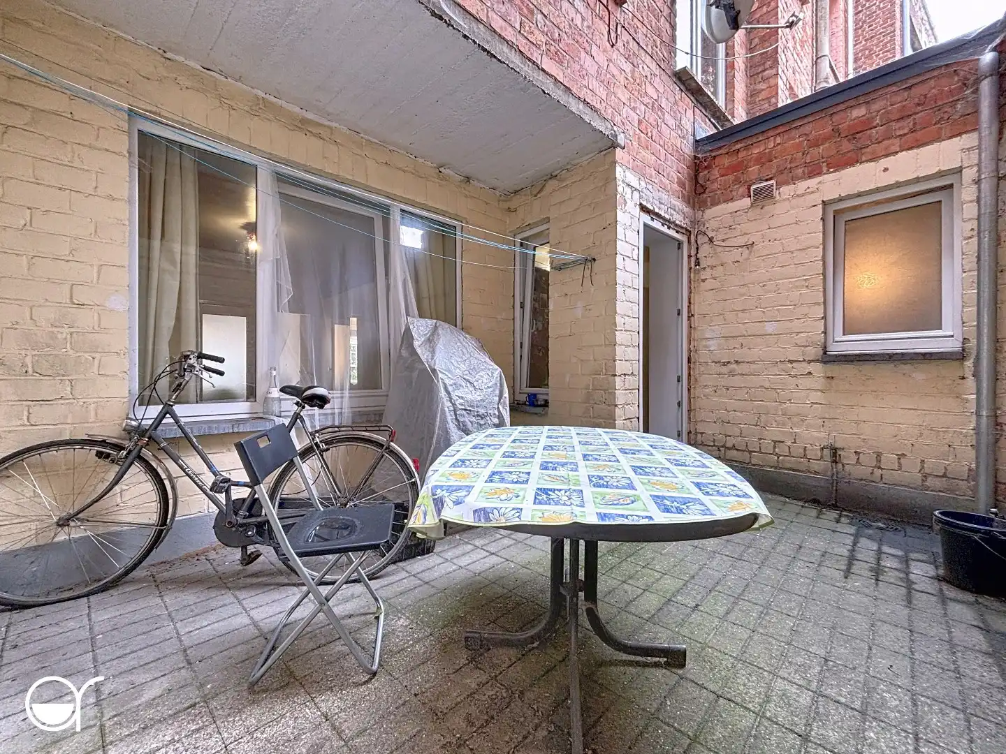 Gelijkvloers appartement met koer op gegeerde locatie foto 13