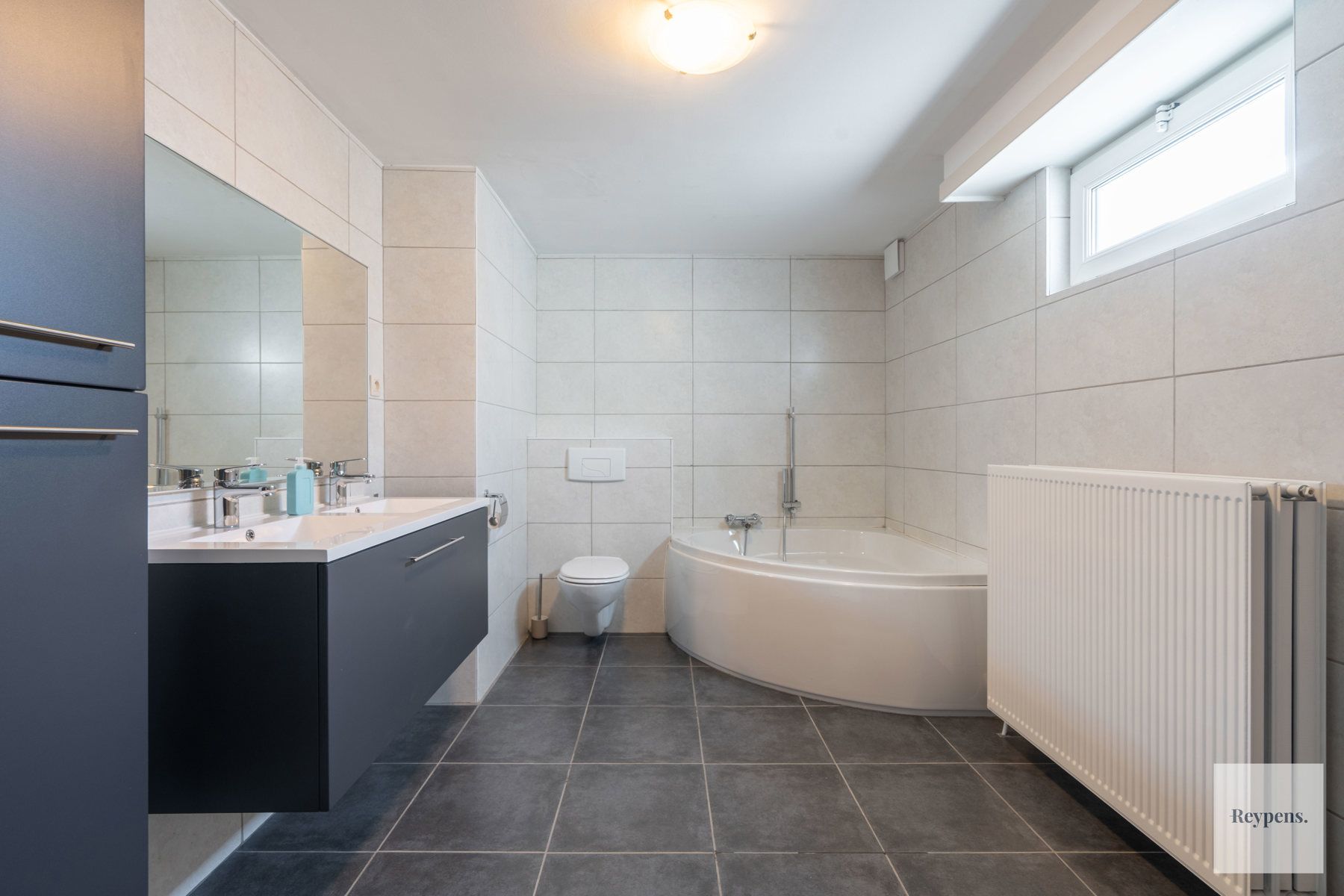 Instapklare woning met grote zonnige tuin op toplocatie! foto 13