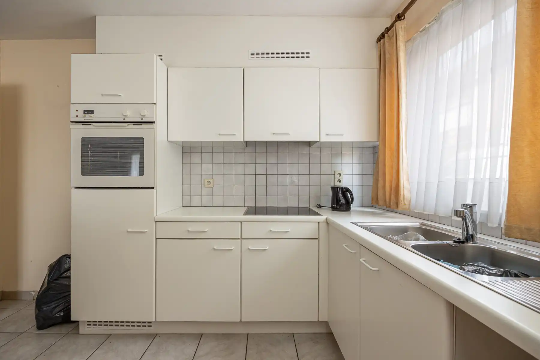 Lichtrijk gelijkvloers hoekappartement in Niel foto 7