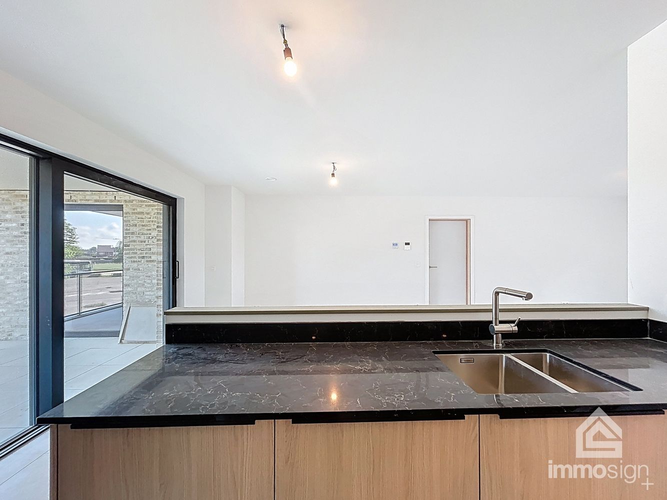 Instapklaar nieuwbouw appartement met 3 slaapkamers, 2 parkeerplaatsen, terras en kelderberging te Kinrooi foto 6