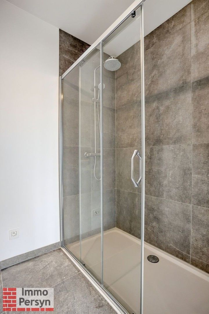 Energiezuinig nieuwbouwappartement – 1 slpk, lift & autostaanplaats foto 13