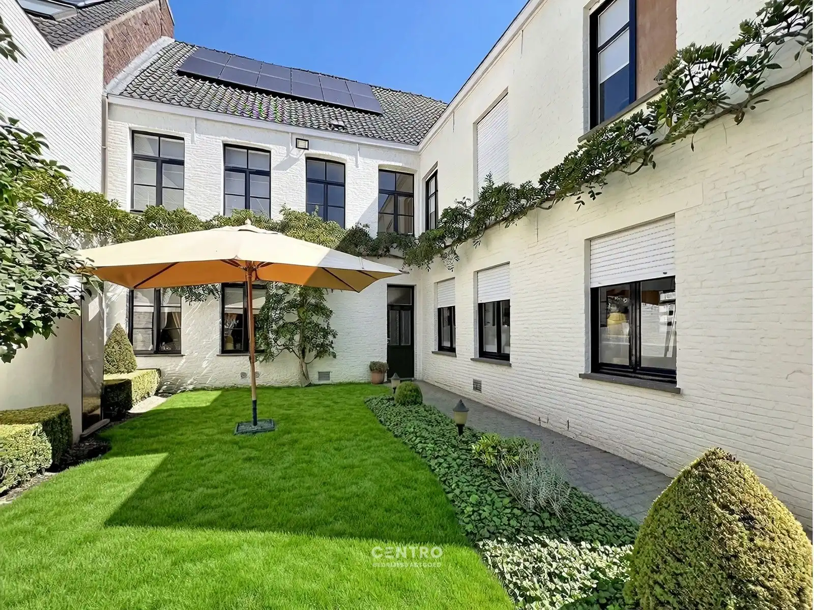 Prachtig herenhuis (thans restaurant met woning) met parkeerterrein en 3 garages op 50m van de Markt van Ingelmunster! Uitbreiding met naastgelegen huis voor B&B mogelijk. foto 31