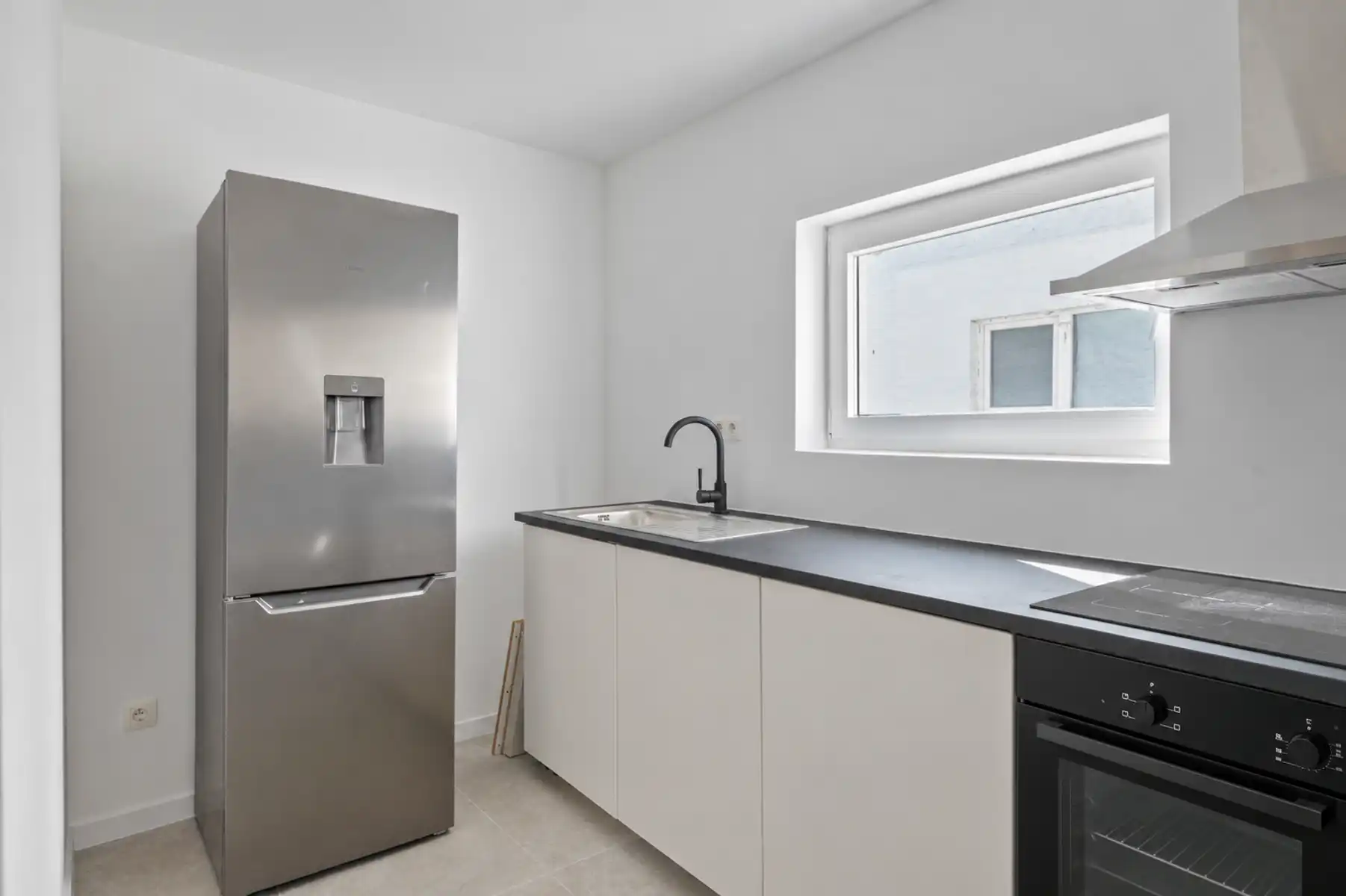 Instapklaar 2slpk-duplexappartement met 2 badkamers, terras en tuin! foto 7