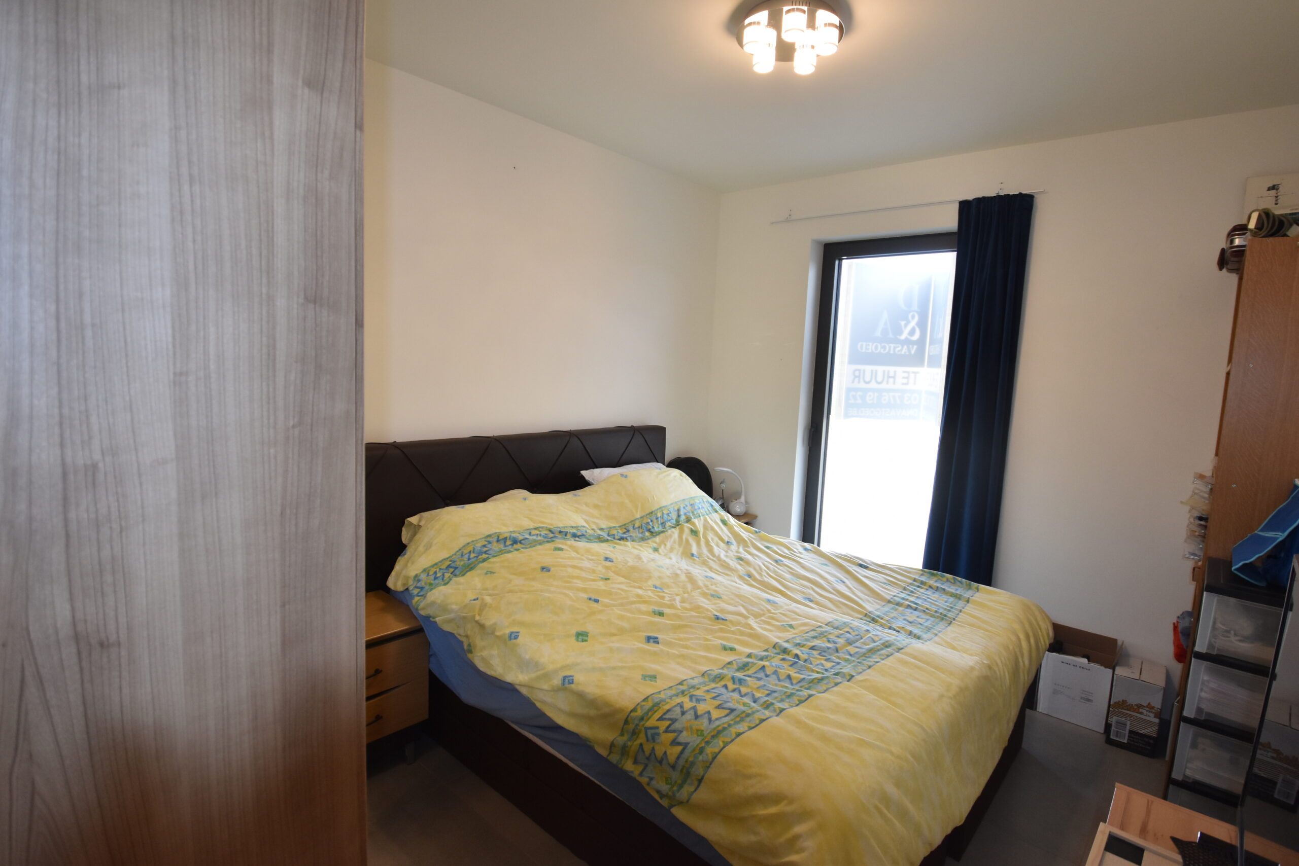 Recent 2-slaapkamerappartement met garage in hartje Nieuwkerken-Waas foto 12