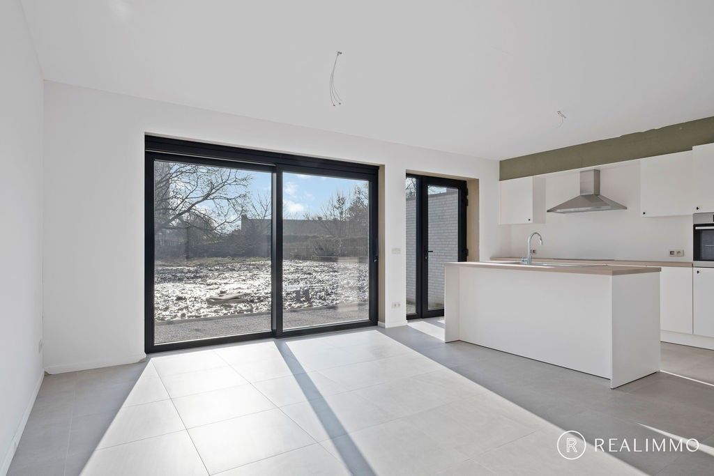 Halfopen nieuwbouwwoning met grote tuin in landelijke stijl in Kerkhove foto 6