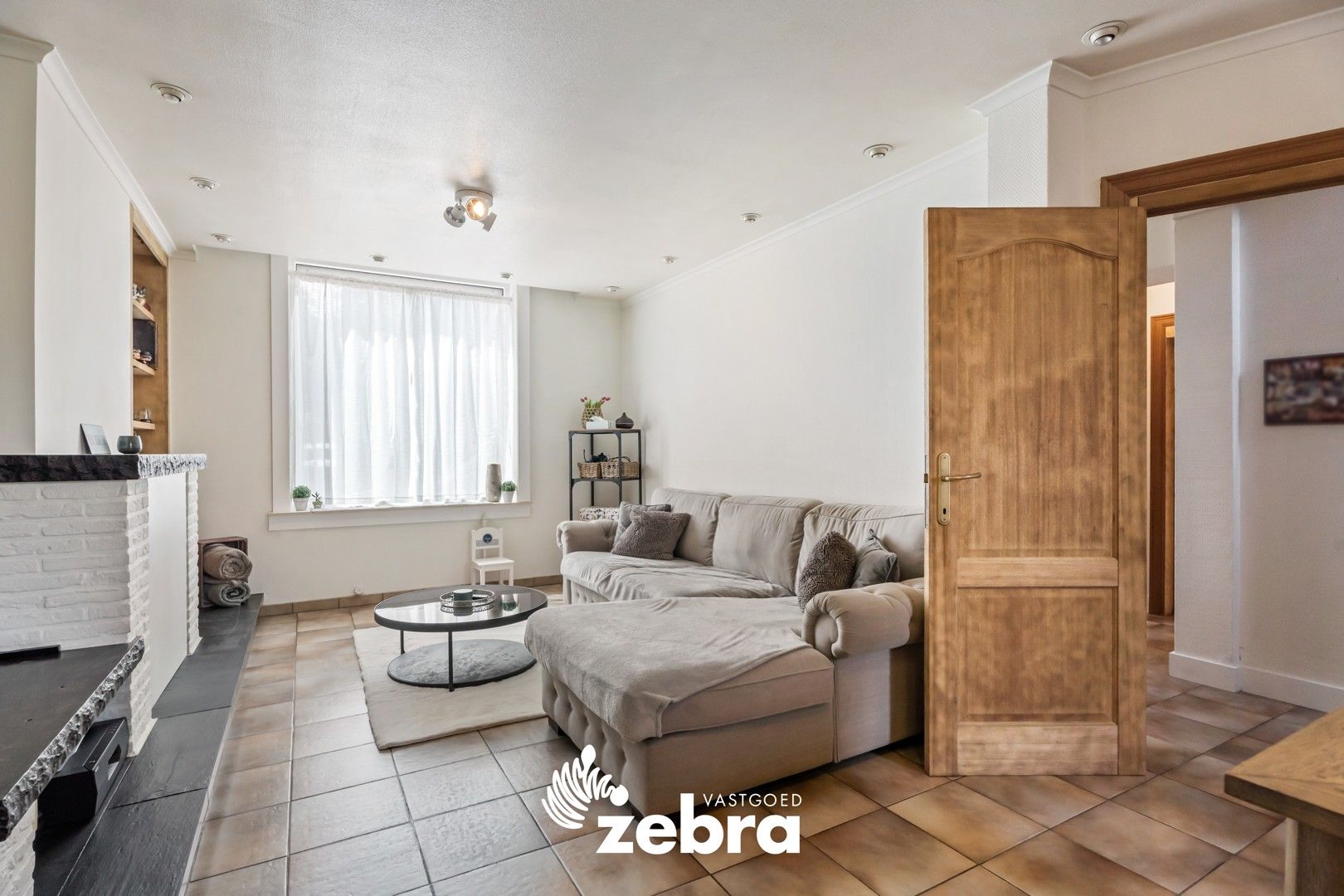 Instapklare woning met grote garage en 3 volwaardige slaapkamers! foto 3