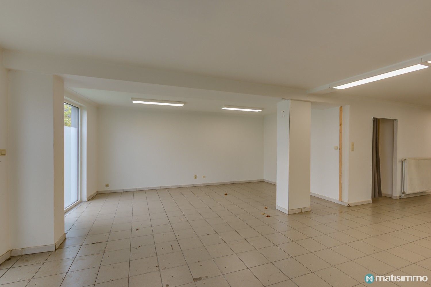 GOED GELEGEN HANDELSRUIMTE MET RIANT WOONGEDEELTE IN CENTRUM VAN HOESELT foto 12