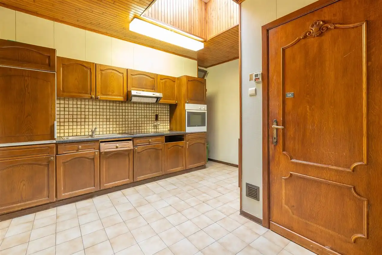 Op te frissen rijwoning in het centrum foto 7