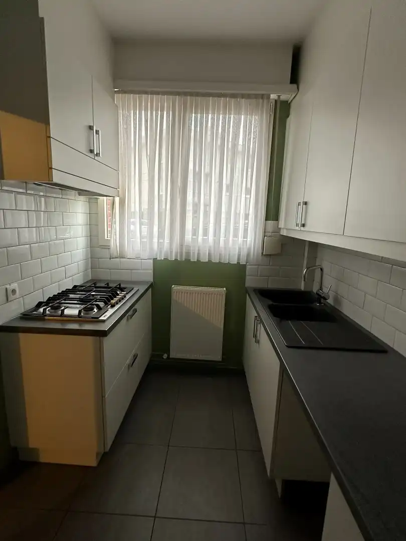 Gelijkvloersppartement met 3 slpk, dubbele garage, tuin en ruime kelder (120 m²) foto 6