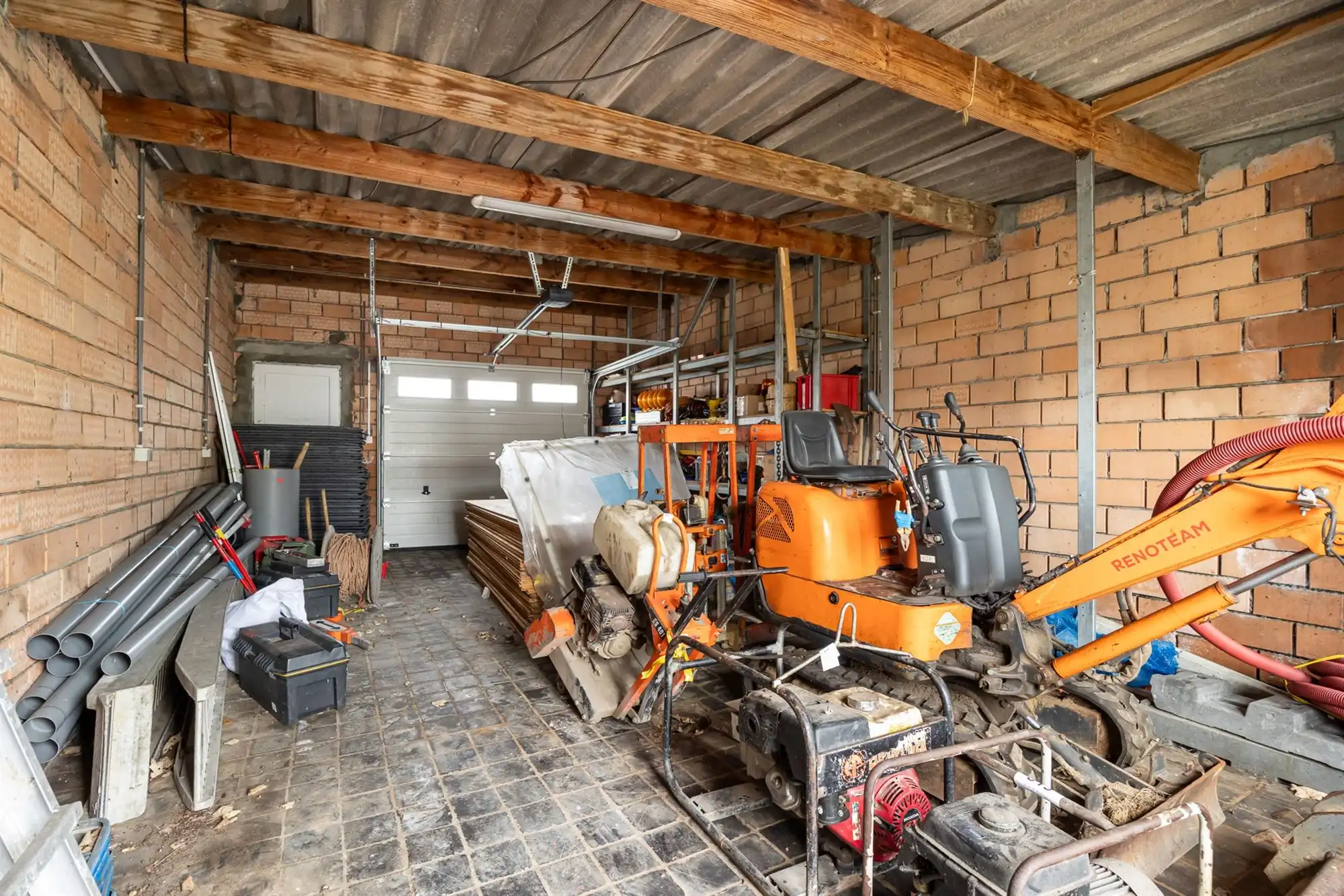 Te renoveren ééngezinswoning met 3 slpkrs, tuin en garage foto 13