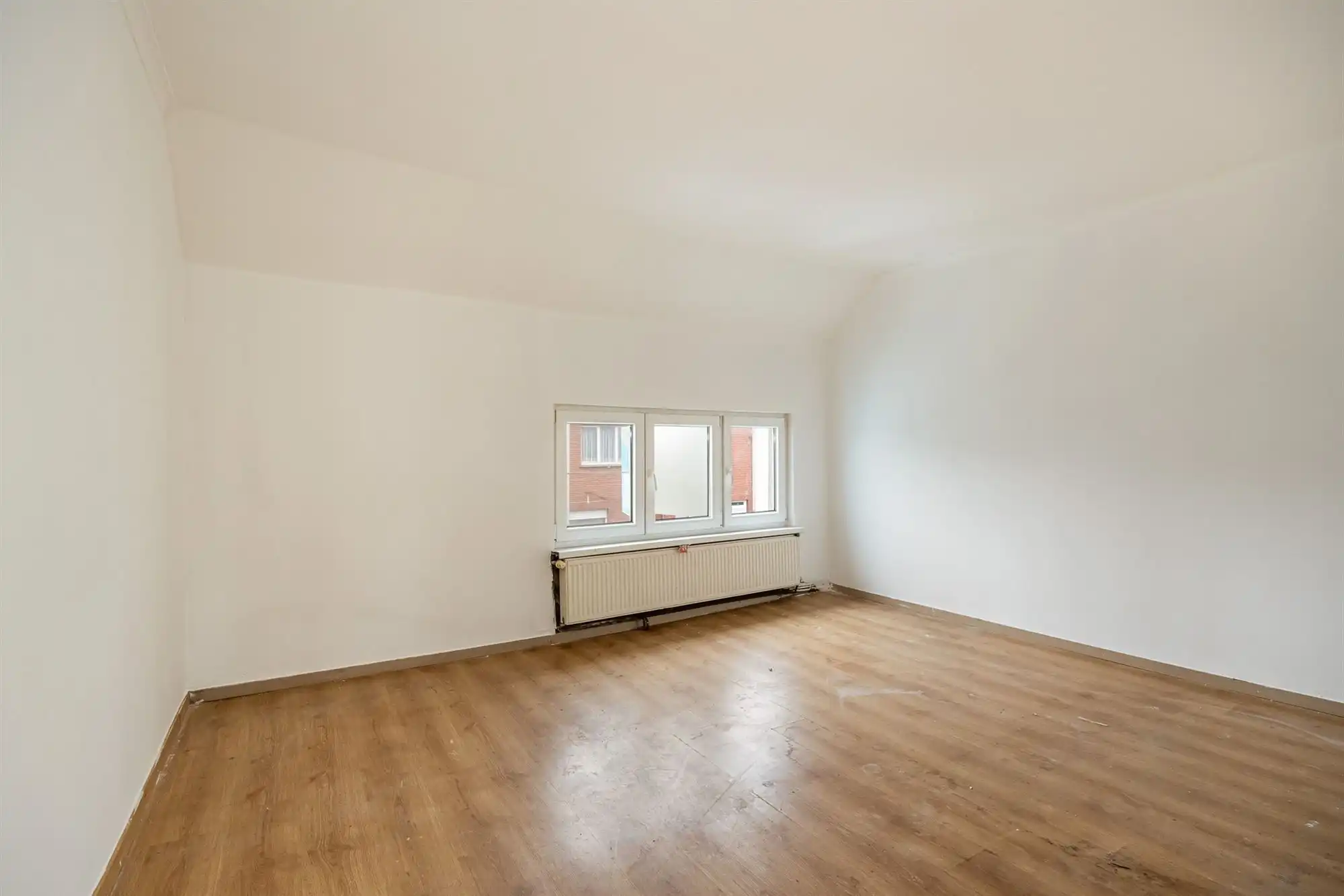 Te renoveren ééngezinswoning met 3 slpkrs, tuin en garage foto 13