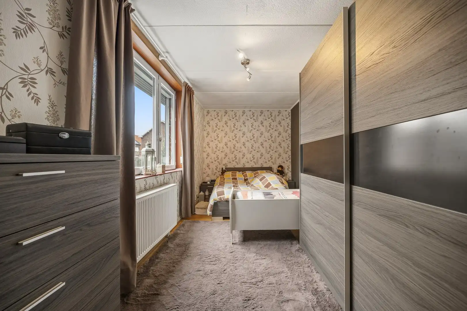 Instapklare rijwoning met 3 slaapkamers en een ruime tuin op de Tiense stadsrand. foto 19