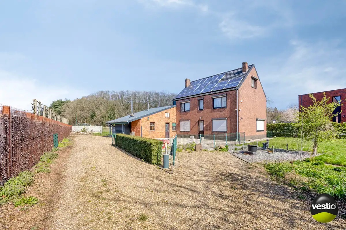 UNIEK BOUWPERCEEL VAN 16A VOOR OB MET AF TE BREKEN WONING TE ZUTENDAAL. foto 7