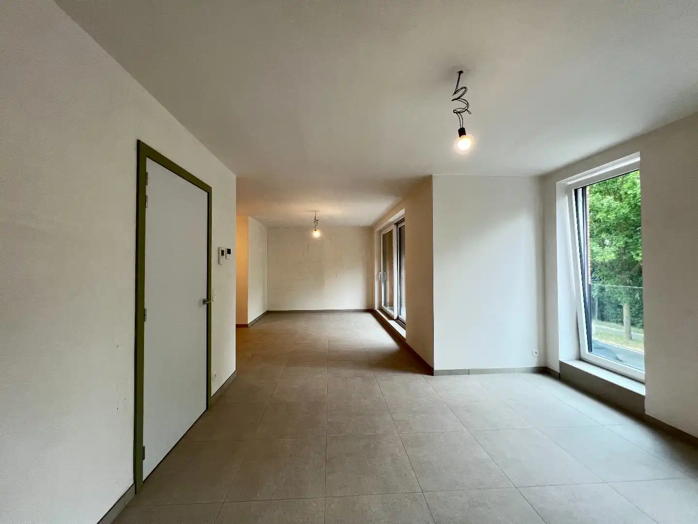 Nieuwbouwappartement met 2 slaapkamers en 2 terrassen te Ieper foto 3