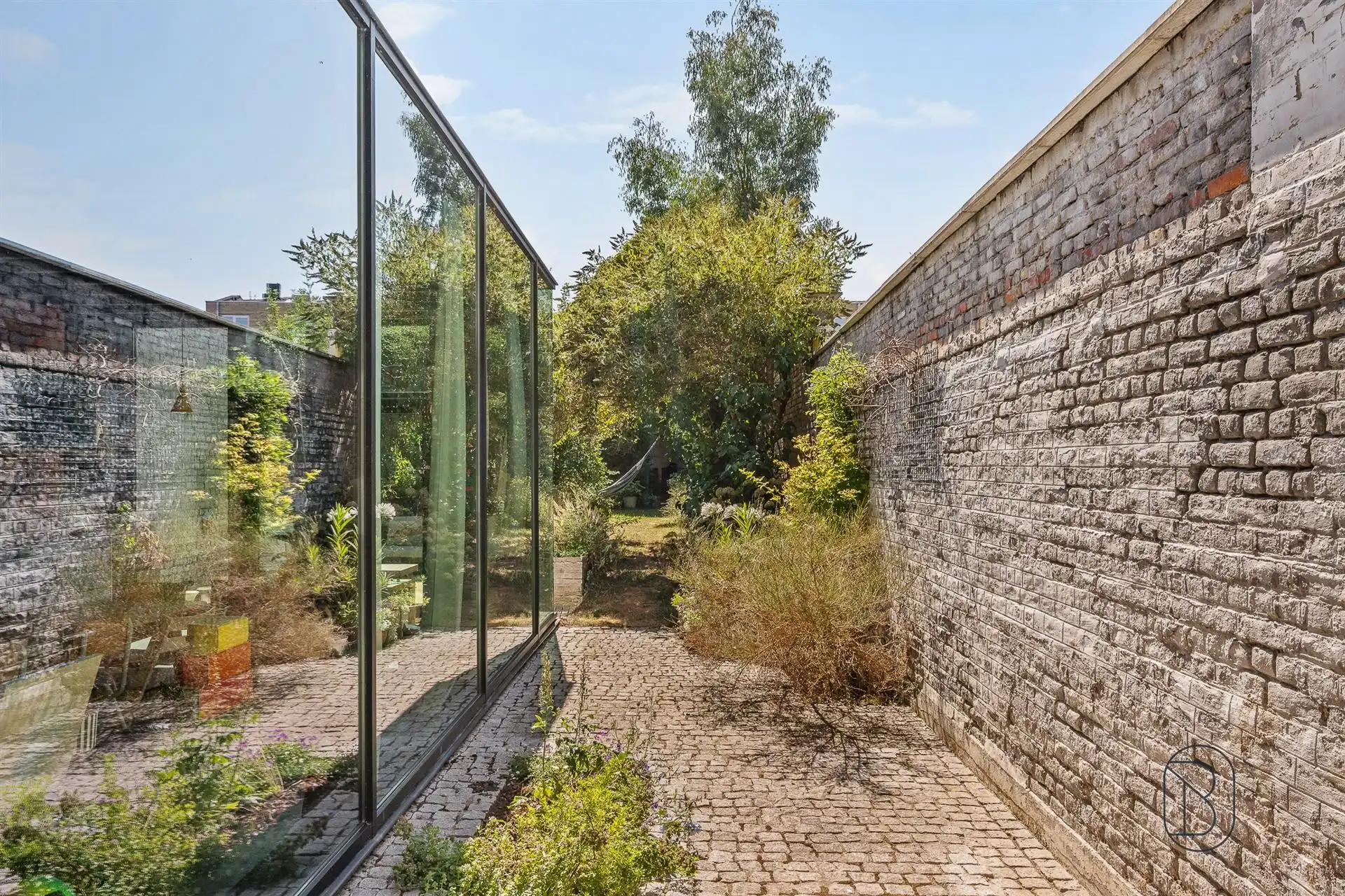 Prachtig gerenoveerde herenwoning met tuin & atelier/duplex foto 4