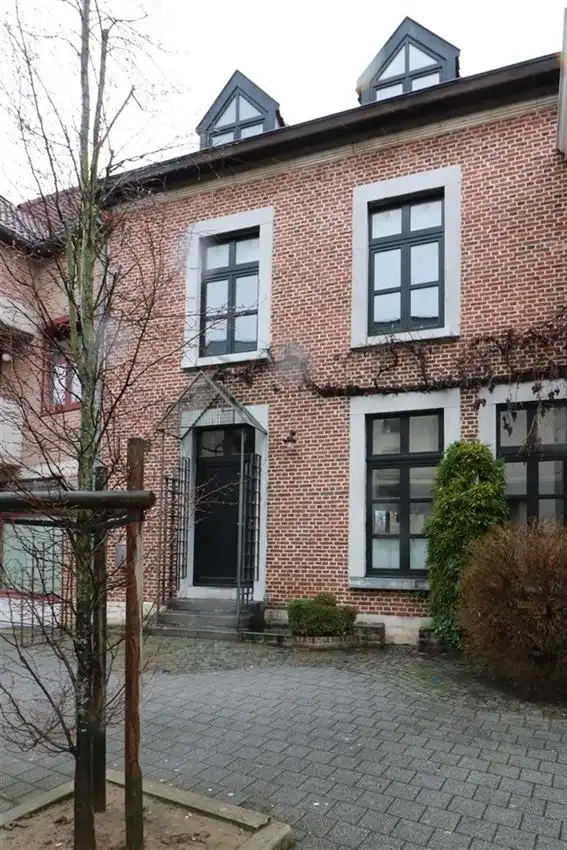 Voormalige patriciërswoning met 3 slpk., prachtige tuin en garage foto 2