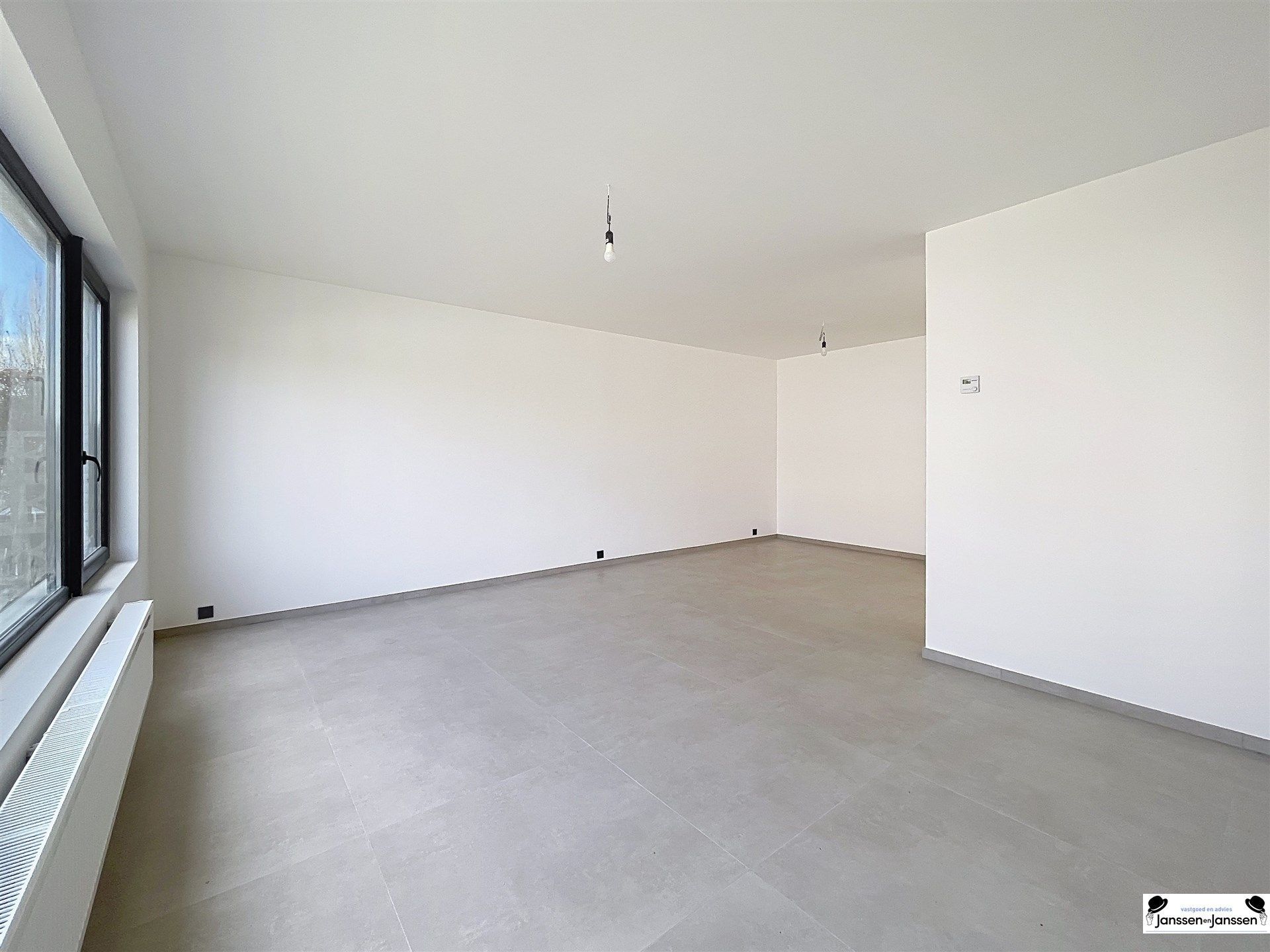 Gelijkvloers gerenoveerd appartement met 2 slaapkamers en tuin foto 2