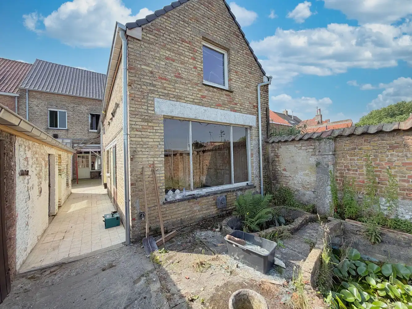 Ruime woning met polyvalente ruimte, zonnige tuin en tal van mogelijkheden foto 17