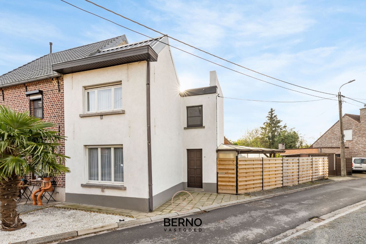 Hoofdfoto van de publicatie: Centraal gelegen woning met tuin en garage.