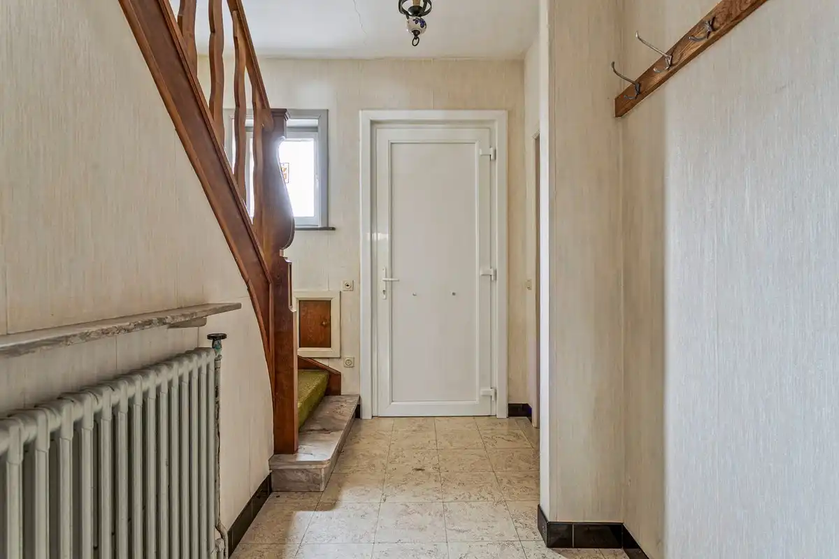 Ruime woning met 4 slaapkamers en garage! foto 2