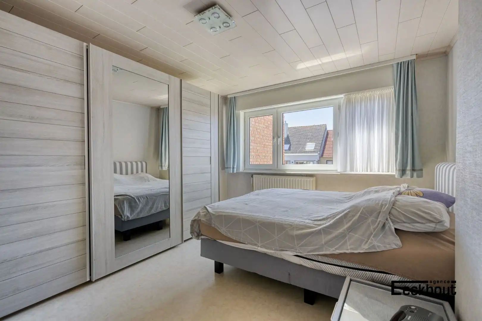 Zeer verzorgde woning met gezellige tuin in de Vuurtorenwijk te Oostende. foto 11