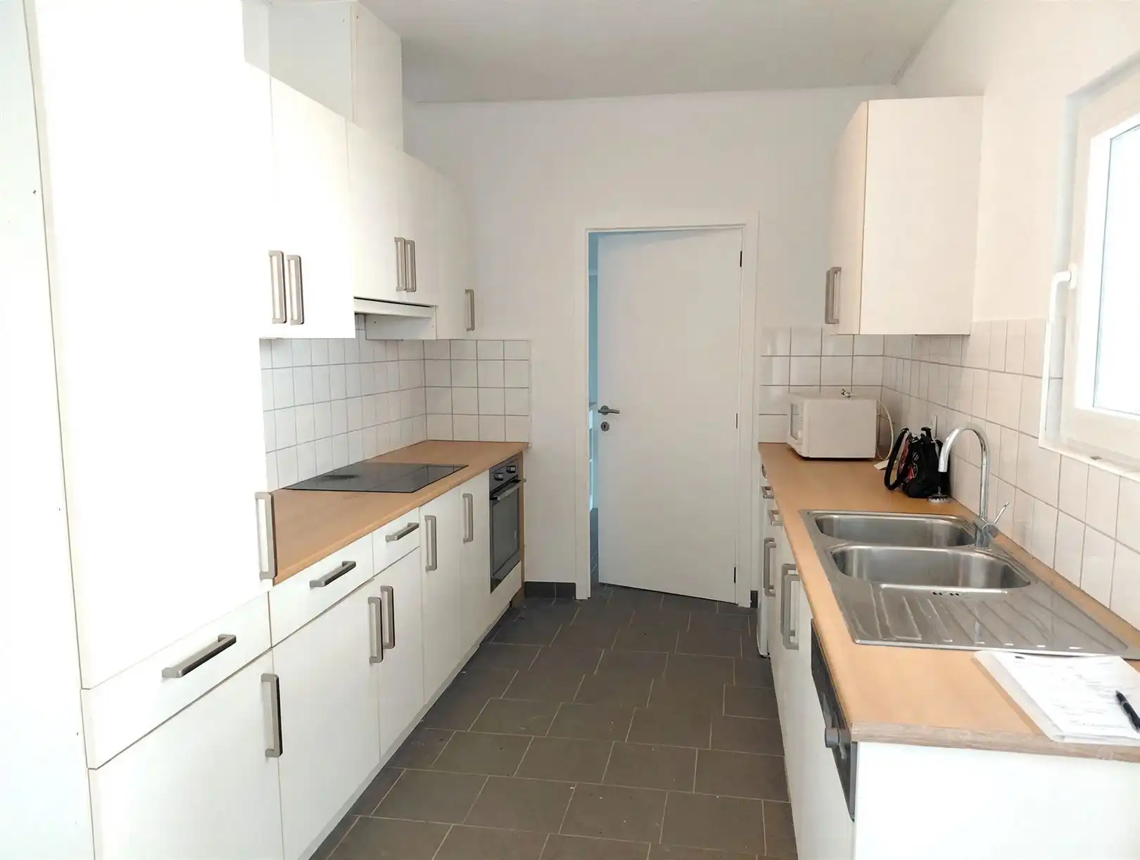 TE HUUR: Gesloten bebouwing met 2 slaapkamers in het centrum van Heusden! foto 6