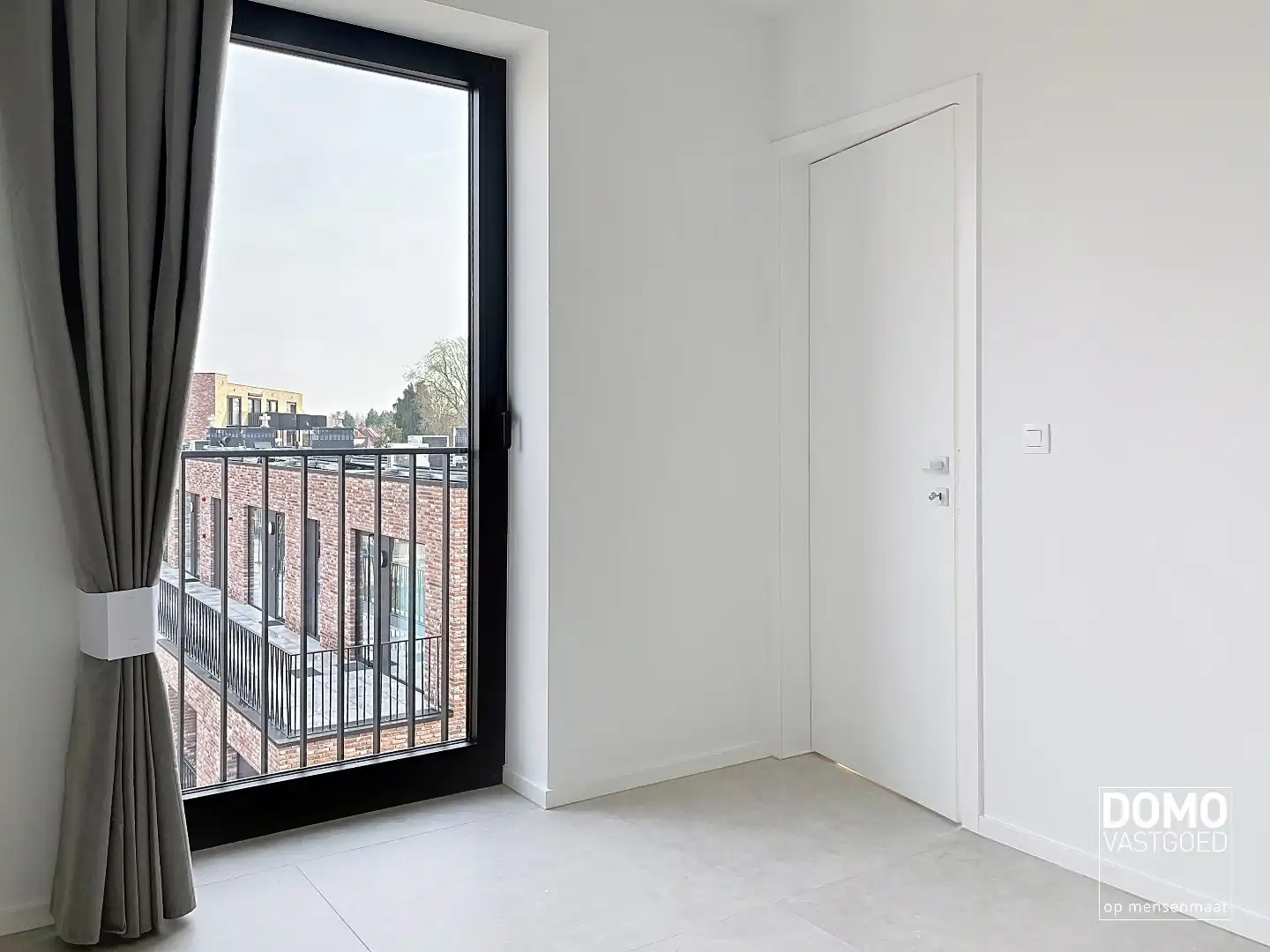Penthouse met twee slaapkamers, ruim terras en autostandplaats te Kermt foto 7