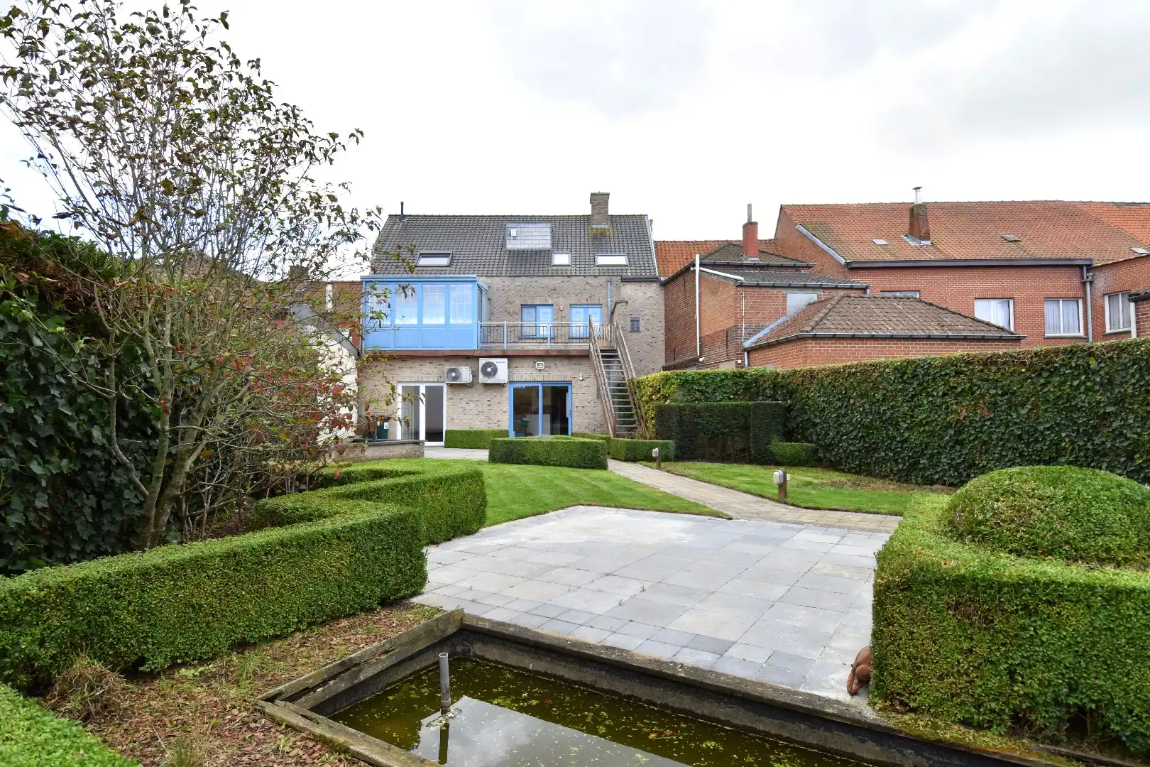 Statige woning met praktijkgedeelte (101 m²), 4 slaapkamers en zonnige tuin te koop in het straatbeeld van Bellegem foto 29