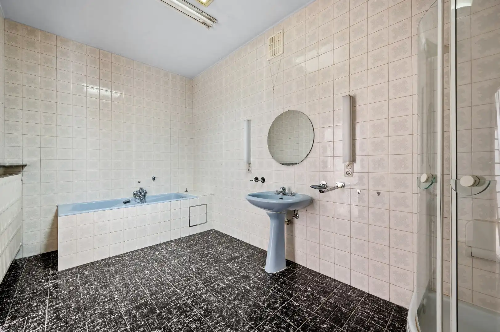 Te renoveren bel-étagewoning op topligging in het centrum van Tienen foto 16