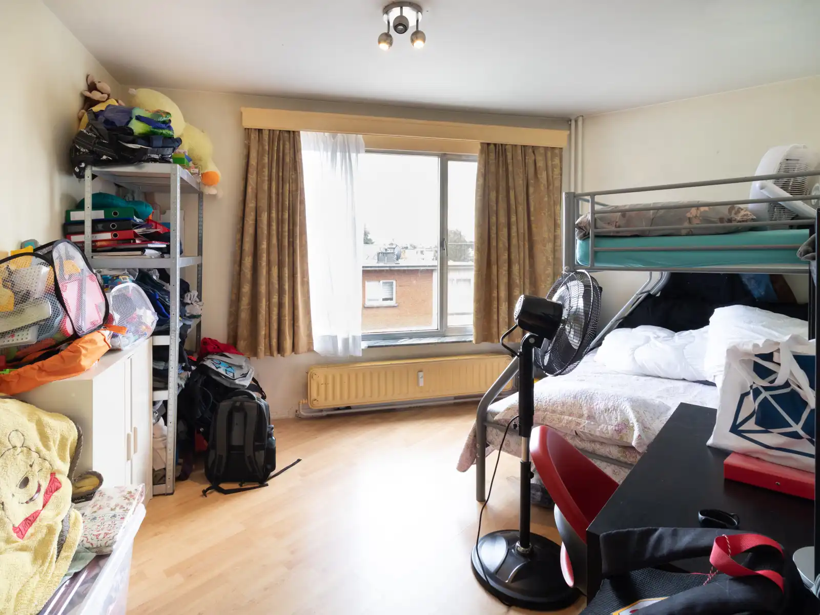 Ruim appartement met berging, terrasje en kelder foto 2