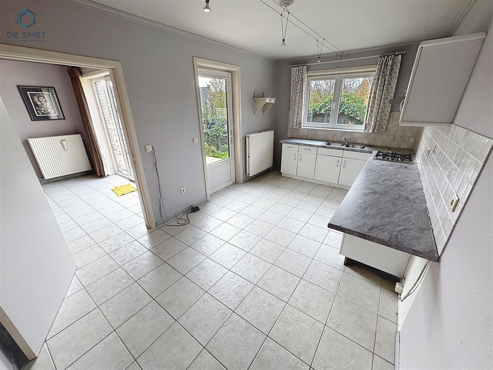 Ruime kangoeroewoning met 5 slaapkamers, 2 garages en tuin in rustige buurt van Brakel foto 5