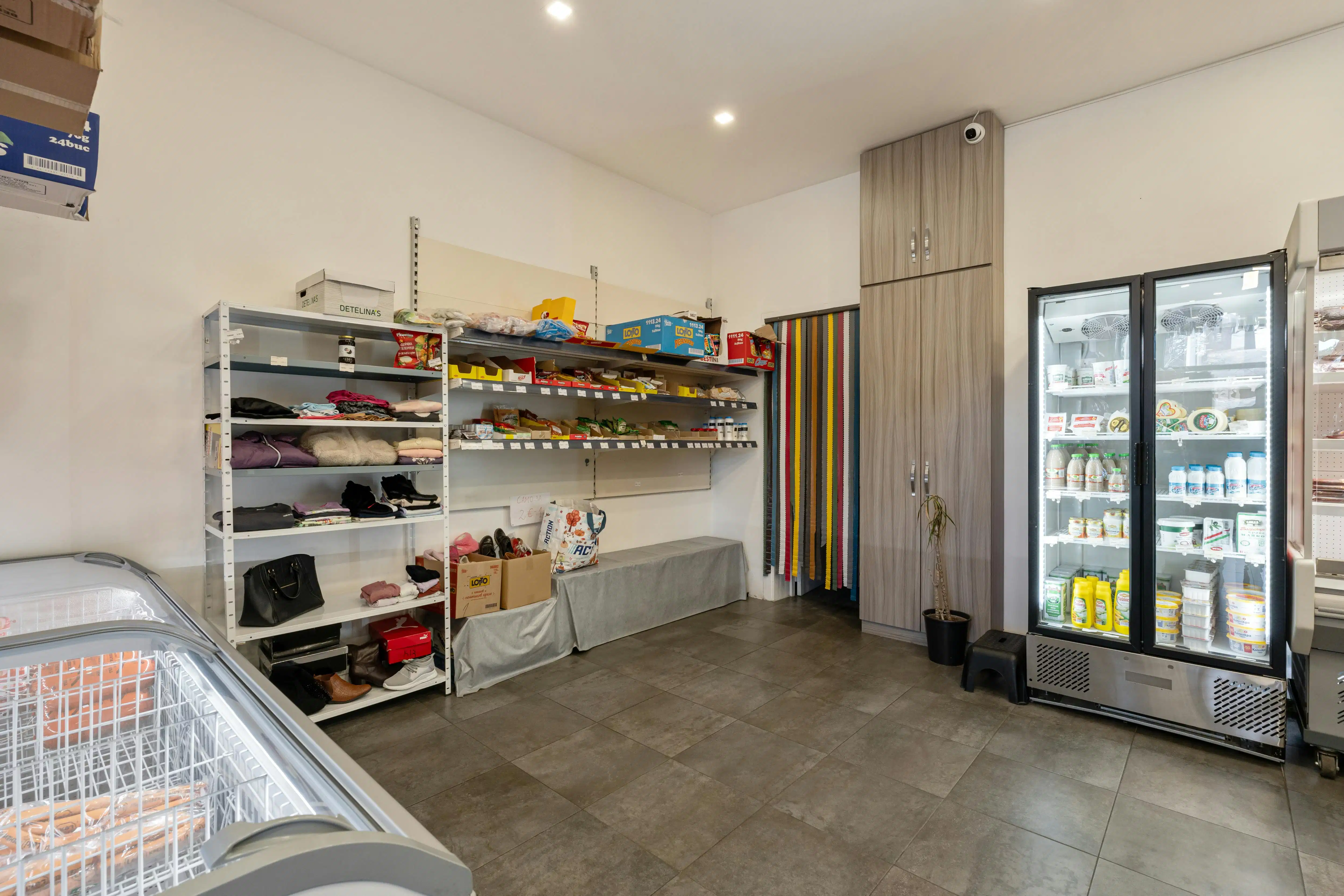 Rendabele opbrengsteigendom met handelspand, magazijn, woonst en 2 appartementen in Genk foto 19