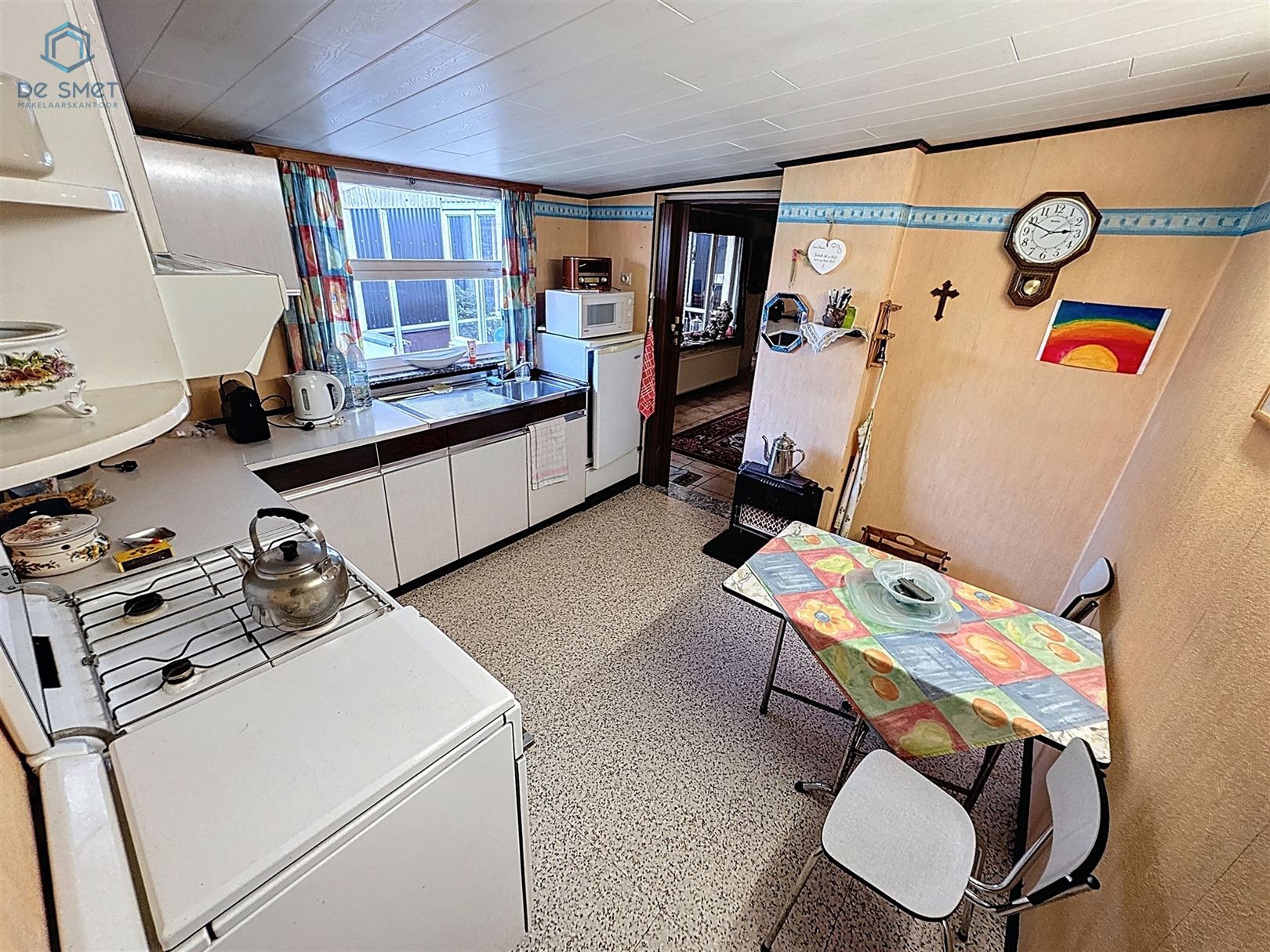 Veelzijdige Te Renoveren Woning met Handelsruimte in het Hart van Schendelbeke foto 8