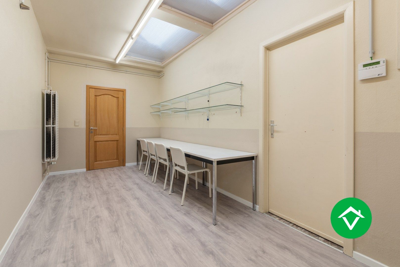 Veelzijdig handelspand met woonst en twee verhuurde appartementen in centrum Aartrijke foto 7