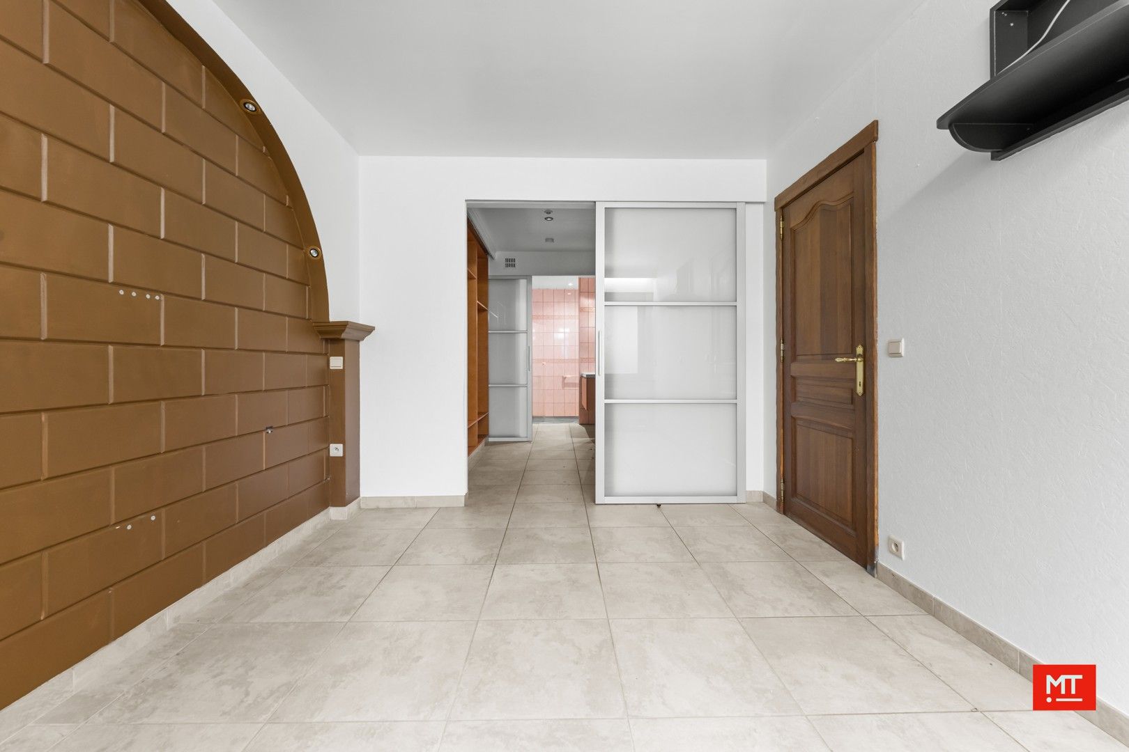 Gelijkvloerse woning met Zuid-Westgerichte tuin en opslagruimte van 130 m² foto 11