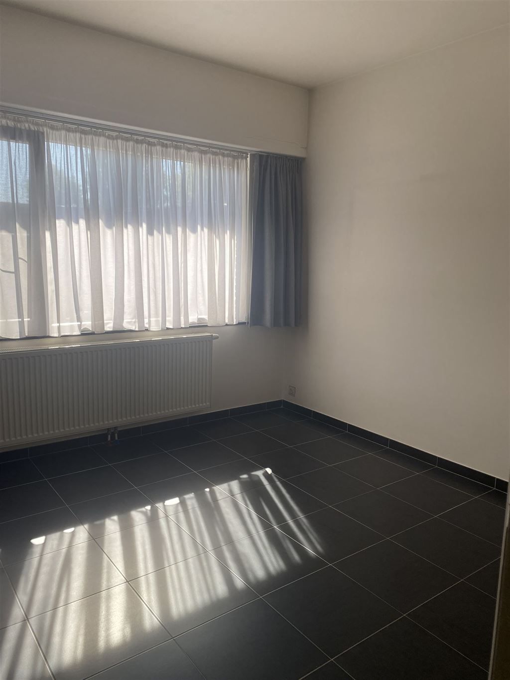 Gelijkvloers appartement in rustige straat foto 8