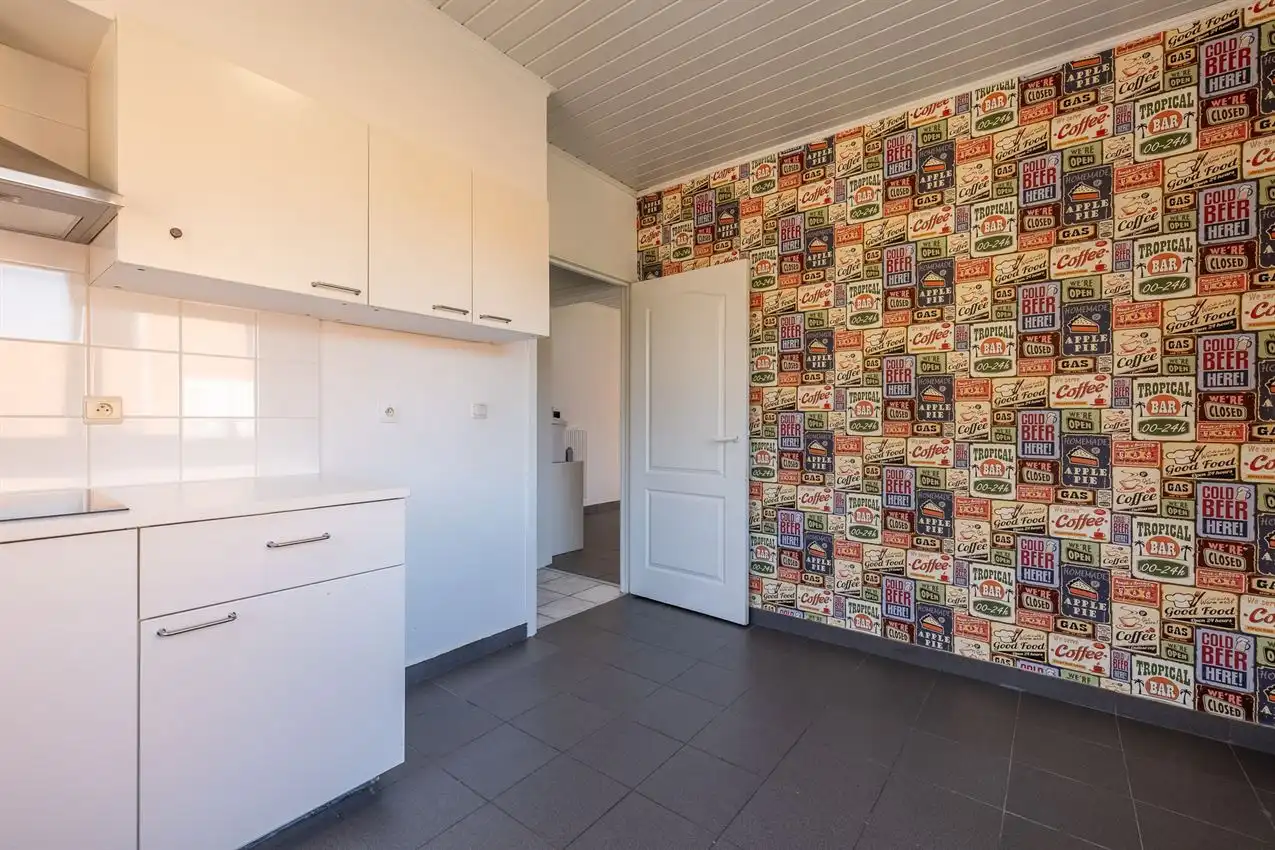 Verzorgde woning met 2 slpk., tuin en garage foto 9