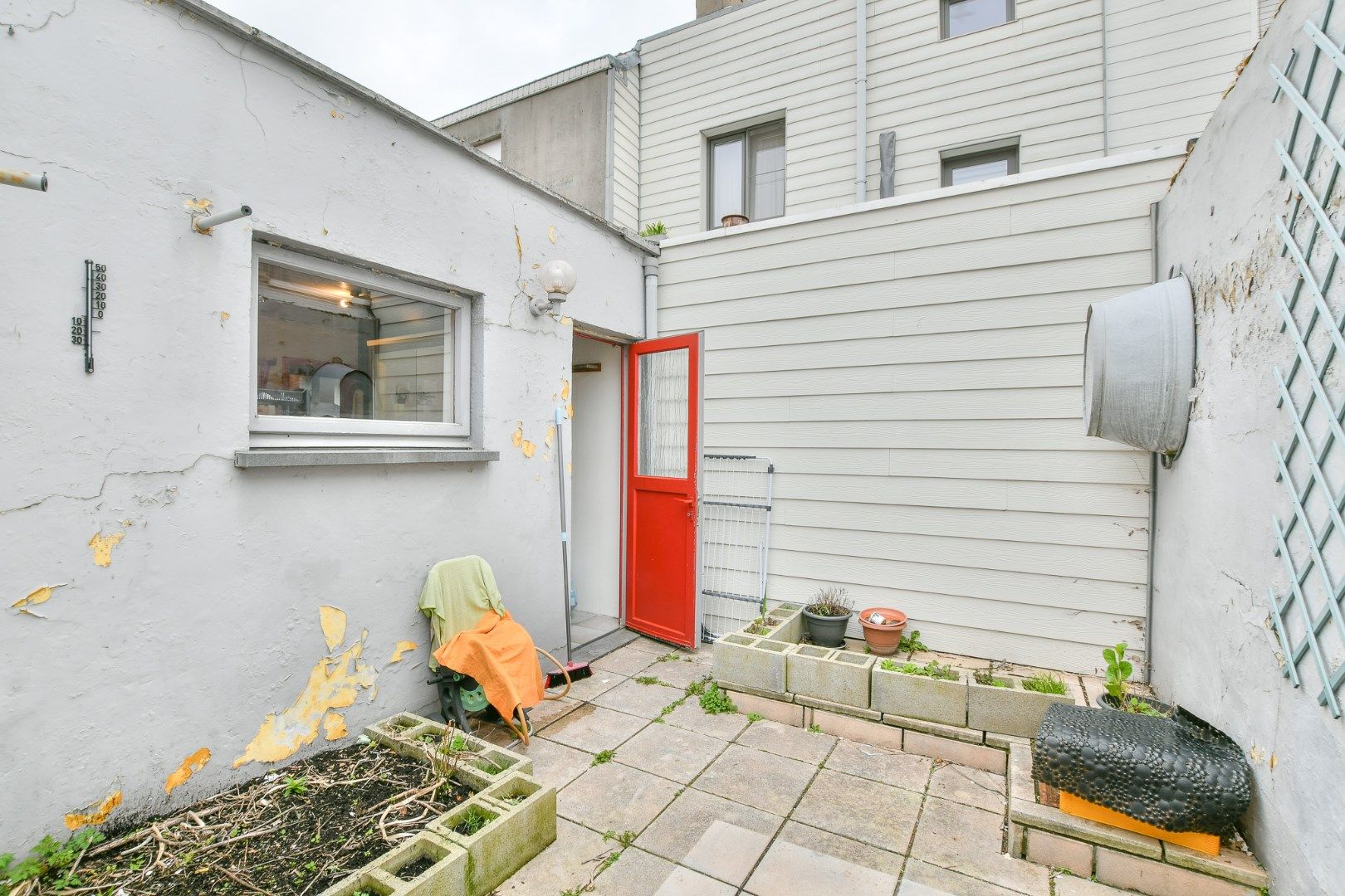 Centraal gelegen rijwoning met 4 slaapkamers en koer  foto 16