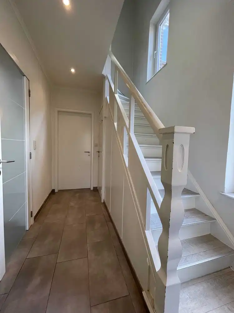 Instapklare gezinswoning met diepe tuin foto 12