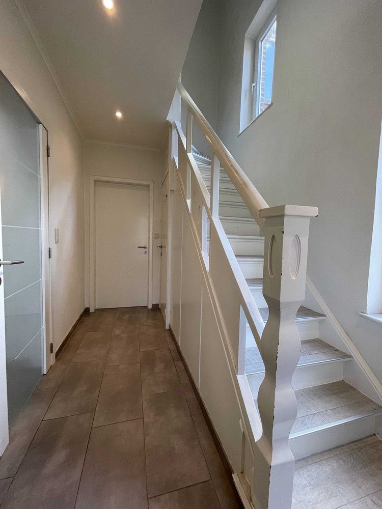 Instapklare gezinswoning met diepe tuin foto 12