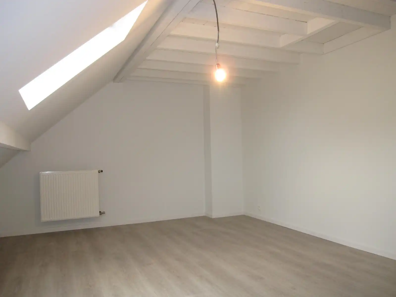 Ruim 3-slpk. appartement met garage foto 8